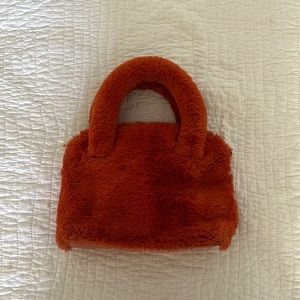 Cutest fuzzy orange bag